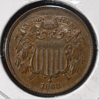 1868 2-CENT PIECE AU/BU. CHECK OUT OUR UPCOMING AUCTIONS ESTIMATE $150 - $200.