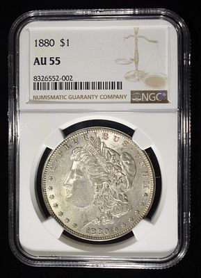 1880 MORGAN DOLLAR NGC AU55. TOP RATED AUCTION HOUSE ESTIMATE $90 - $130.