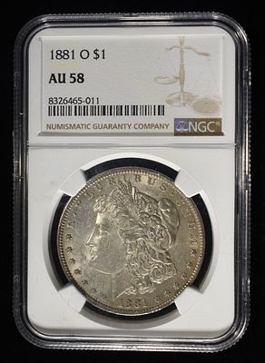 1881-0 MORGAN DOLLAR NGC AU58. TOP RATED AUCTION HOUSE ESTIMATE $90 - $130.