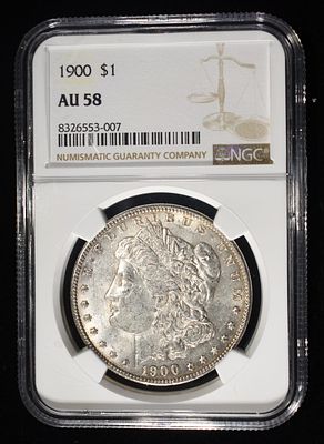 1900 MORGAN DOLLAR NGC AU58. WEEKLY COIN & CURRENCY AUCTIONS ESTIMATE $90 - $130.
