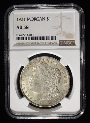 1921 MORGAN DOLLAR NGC AU58. LEADERS IN ON-LINE AUCTIONS ESTIMATE $80 - $120.