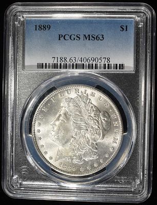 1889 MORGAN DOLLAR PCGS MS63. LEADERS IN ON-LINE AUCTIONS ESTIMATE $100 - $150.