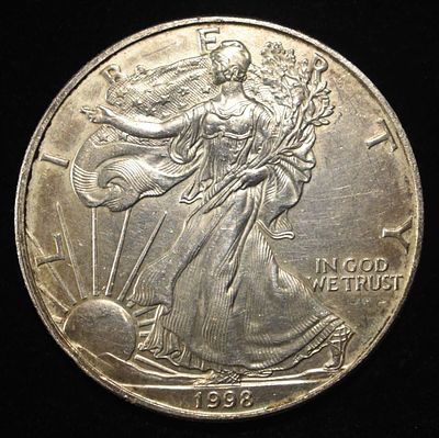1998 AMERICAN SILVER EAGLE. BID WITH SILVER CITY AUCTIONS ESTIMATE $130 - $180.
