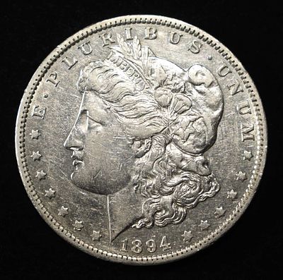 1894-O MORGAN DOLLAR AU. TOP RATED AUCTION HOUSE ESTIMATE $300 - $350.