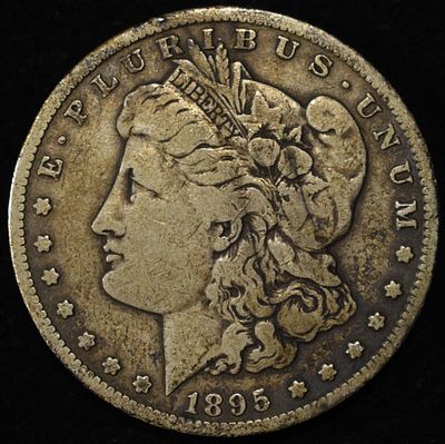 1895-S MORGAN DOLLAR. CHECK OUT OUR UPCOMING AUCTIONS ESTIMATE $90 - $130.