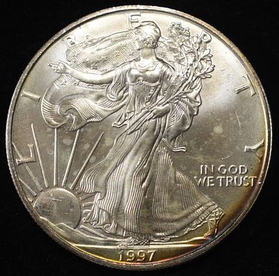 1997 AMERICAN SILVER EAGLE. BID WITH SILVER CITY AUCTIONS ESTIMATE $110 - $160.