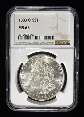 1883-O MORGAN DOLLAR NGC MS63. TOP RATED AUCTION HOUSE ESTIMATE $150 - $200.