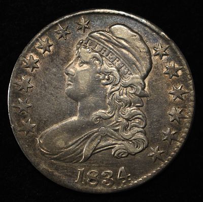 1834 CAPPED BUST HALF DOLLAR XF/AU. TOP RATED AUCTION HOUSE ESTIMATE $350 - $400.