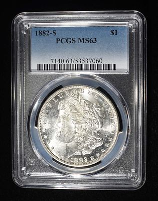 1882-S MORGAN DOLLAR PCGS MS-63. BID WITH SILVER CITY AUCTIONS ESTIMATE $130 - $150.