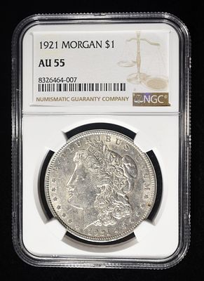 1921 MORGAN DOLLAR NGC AU55. BID WITH SILVER CITY AUCTIONS ESTIMATE $80 - $120.