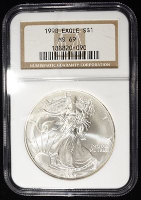 1998 AMERICAN SILVER EAGLE NGC MS69. TOP RATED AUCTION HOUSE ESTIMATE $100 - $150.