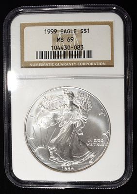 1999 AMERICAN SILVER EAGLE NGC MS69. WEEKLY COIN & CURRENCY AUCTIONS ESTIMATE $100 - $150.