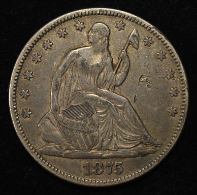 1875 SEATED LIBERTY HALF DOLLAR XF. CHECK OUT OUR UPCOMING AUCTIONS ESTIMATE $180 - $220.