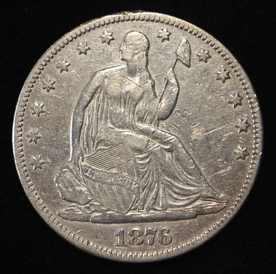 1876 SEATED LIBERTY HALF DOLLAR VF/XF. LEADERS IN ON-LINE AUCTIONS ESTIMATE $150 - $200.