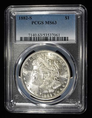 1882-S MORGAN DOLLAR PCGS MS-63. BID WITH SILVER CITY AUCTIONS ESTIMATE $130 - $150.