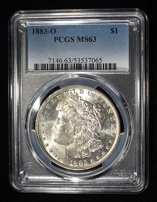 1883-O MORGAN DOLLAR PCGS MS-63. BID WITH SILVER CITY AUCTIONS ESTIMATE $130 - $150.