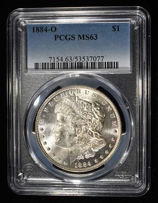 1884-O MORGAN DOLLAR PCGS MS-63. TOP RATED AUCTION HOUSE ESTIMATE $130 - $150.