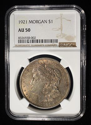 1921 MORGAN DOLLAR NGC AU50. WEEKLY COIN & CURRENCY AUCTIONS ESTIMATE $80 - $120.