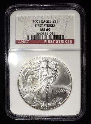 2001 AMERICAN SILVER EAGLE NGC MS69. BID WITH SILVER CITY AUCTIONS ESTIMATE $120 - $170.