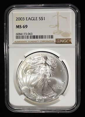 2003 AMERICAN SILVER EAGLE NGC MS69. TOP RATED AUCTION HOUSE ESTIMATE $100 - $150.
