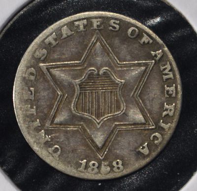1858 3-CENT SILVER XF. WEEKLY COIN & CURRENCY AUCTIONS ESTIMATE $150 - $200.