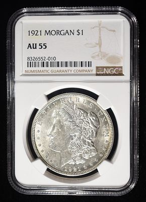 1921 MORGAN DOLLAR NGC AU55. LEADERS IN ON-LINE AUCTIONS ESTIMATE $80 - $120.