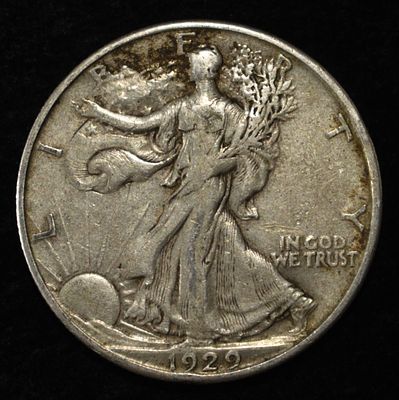 1929-D WALKING LIBERTY HALF XF. BID WITH SILVER CITY AUCTIONS ESTIMATE $150 - $200.