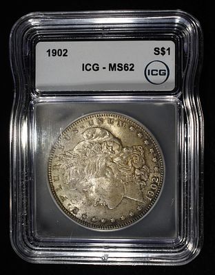 1902 MORGAN DOLLAR ICG MS-62. TOP RATED AUCTION HOUSE ESTIMATE $180 - $220.