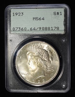 1923 PEACE DOLLAR PCGS MS-64 RATTLER HOLDER. WEEKLY COIN & CURRENCY AUCTIONS ESTIMATE $130 - $150.