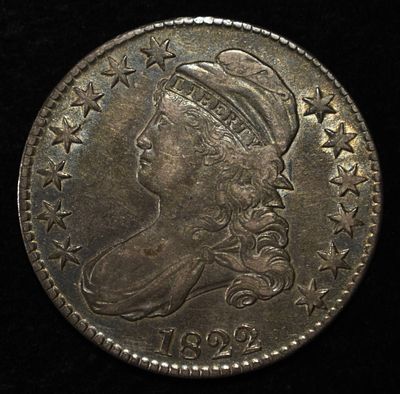 1822 BUST HALF DOLLAR XF/AU COLOR. CHECK OUT OUR UPCOMING AUCTIONS ESTIMATE $400 - $500.