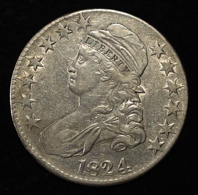 1824 BUST HALF DOLLAR XF. BID WITH SILVER CITY AUCTIONS ESTIMATE $200 - $250.