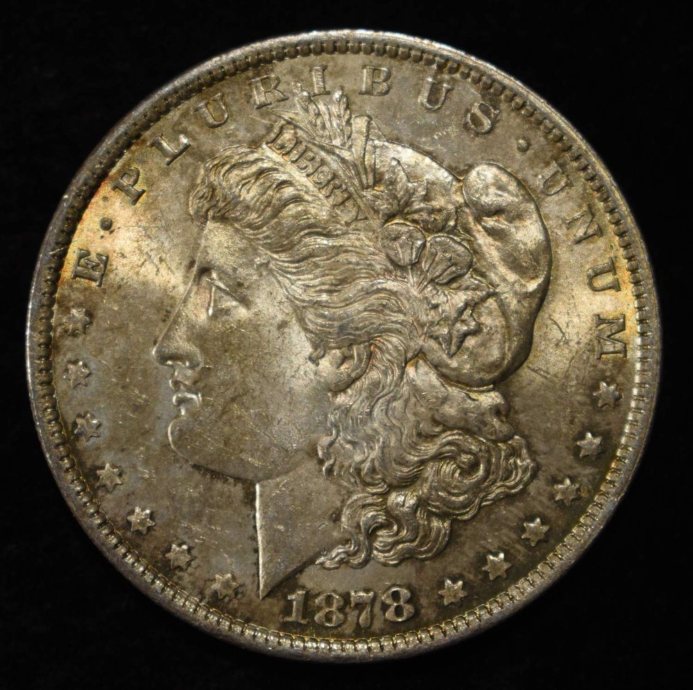 1878 7TF REV 79 MORGAN DOLLAR BU COLOR. TOP RATED AUCTION HOUSE ESTIMATE $200 - $250.