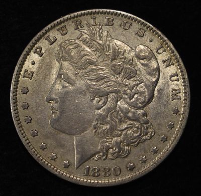 1880-O MORGAN DOLLAR AU. WEEKLY COIN & CURRENCY AUCTIONS ESTIMATE $100 - $130.