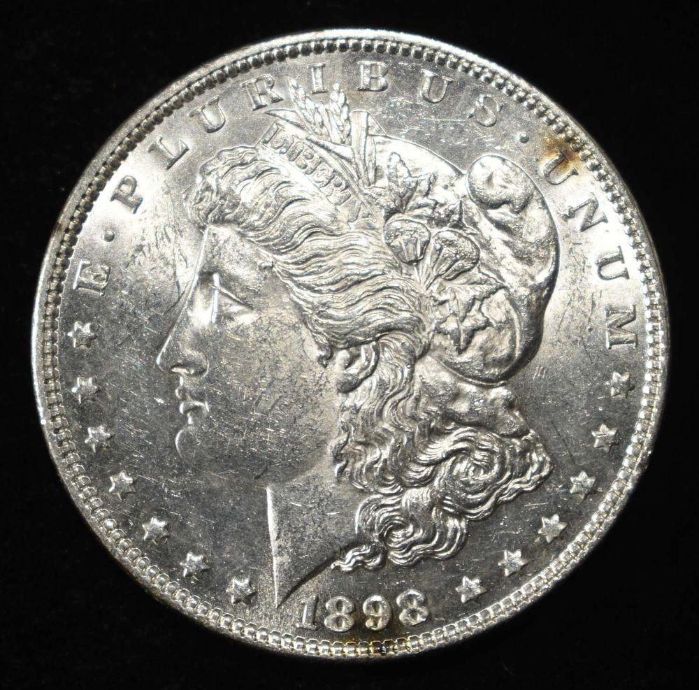1898 MORGAN DOLLAR BU. WEEKLY COIN & CURRENCY AUCTIONS ESTIMATE $100 - $130.