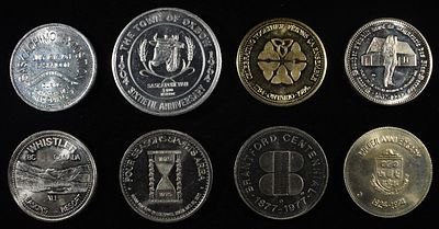 (8) FOREIGN ANNIVERSARY DOLLARS. TOP RATED AUCTION HOUSE ESTIMATE $80 - $120.