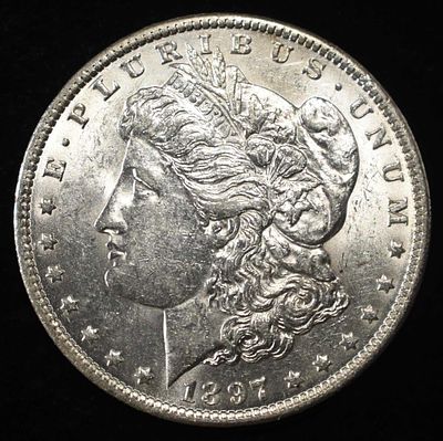 1897-O MORGAN DOLLAR FROSTY BU. WEEKLY COIN & CURRENCY AUCTIONS ESTIMATE $1550 - $2050.