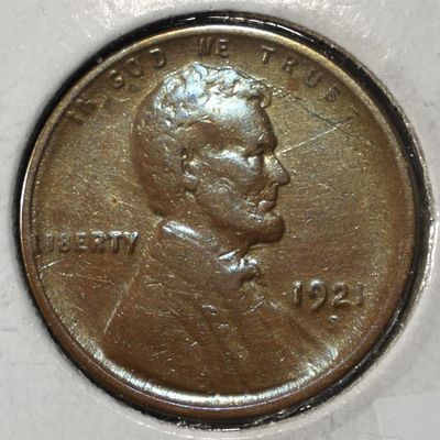 1921-S WHEAT CENT AU. LEADERS IN ON-LINE AUCTIONS ESTIMATE $75 - $100.