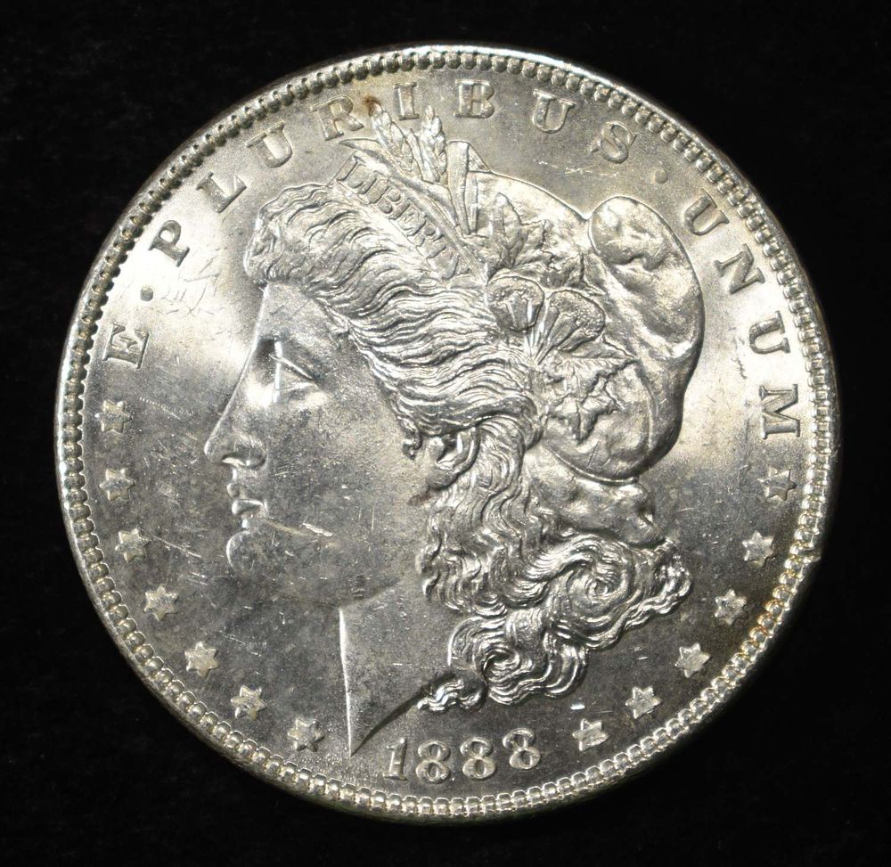 1888 MORGAN DOLLAR BU. BID WITH SILVER CITY AUCTIONS ESTIMATE $150 - $200.