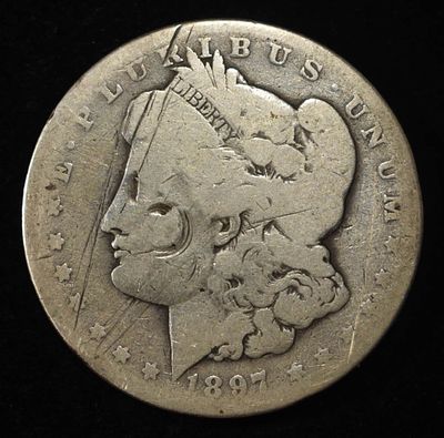 1897-O MORGAN DOLLAR. WEEKLY COIN & CURRENCY AUCTIONS ESTIMATE $100 - $150.