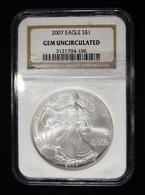2007 AMERICAN SILVER EAGLE NGC GEM UNC. TOP RATED AUCTION HOUSE ESTIMATE $110 - $160.