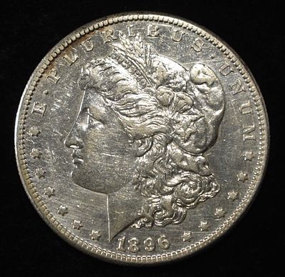 1896-S MORGAN DOLLAR AU. CHECK OUT OUR UPCOMING AUCTIONS ESTIMATE $1200 - $1400.