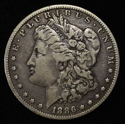 1886-O MORGAN DOLLAR VF. WEEKLY COIN & CURRENCY AUCTIONS ESTIMATE $80 - $100.