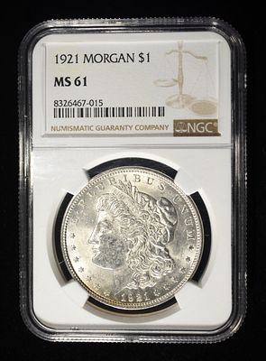 1921 MORGAN DOLLAR NGC MS61. CHECK OUT OUR UPCOMING AUCTIONS ESTIMATE $80 - $120.