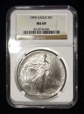 1995 AMERICAN SILVER EAGLE NGC MS69. BID WITH SILVER CITY AUCTIONS ESTIMATE $130 - $180.