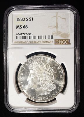 1880-S MORGAN DOLLAR NGC MS66. CHECK OUT OUR UPCOMING AUCTIONS ESTIMATE $340 - $390.