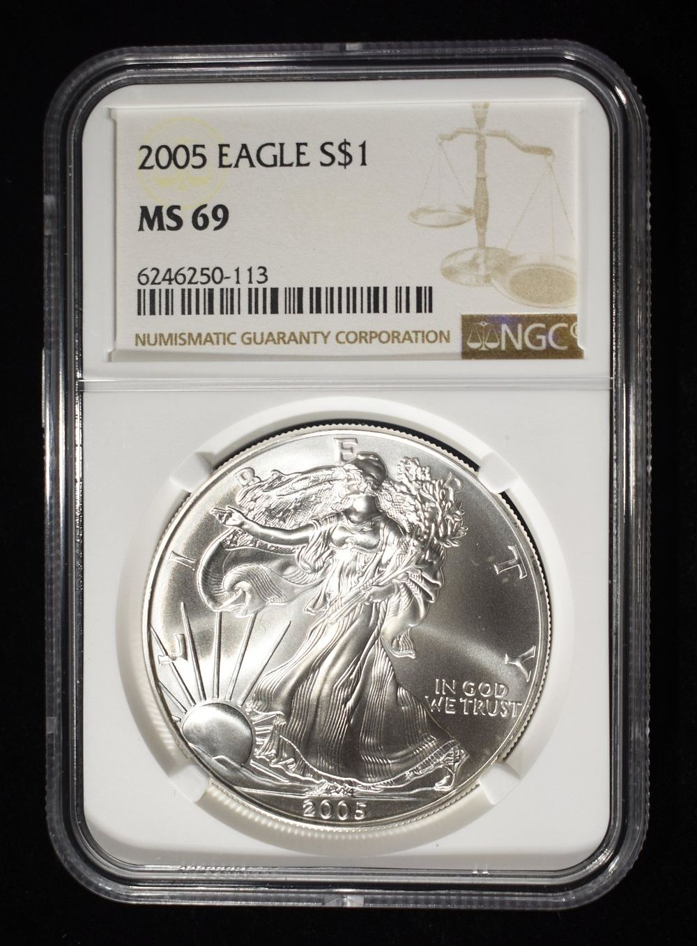 2005 AMERICAN SILVER EAGLE NGC MS69. CHECK OUT OUR UPCOMING AUCTIONS ESTIMATE $100 - $150.