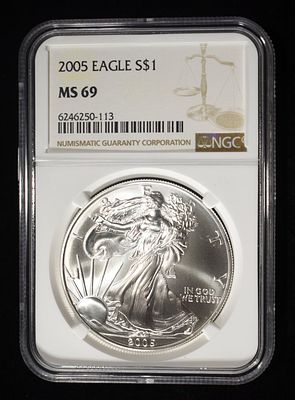 2005 AMERICAN SILVER EAGLE NGC MS69. CHECK OUT OUR UPCOMING AUCTIONS ESTIMATE $100 - $150.