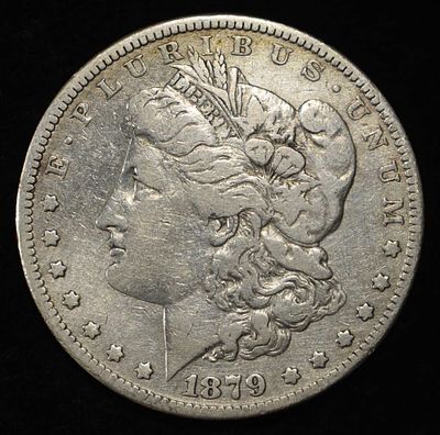 1879 MORGAN DOLLAR. LEADERS IN ON-LINE AUCTIONS ESTIMATE $90 - $130.