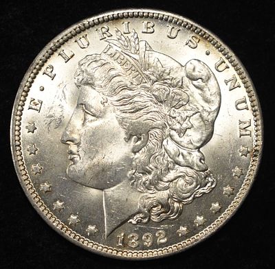 1892-O MORGAN DOLLAR CH BU. WEEKLY COIN & CURRENCY AUCTIONS ESTIMATE $700 - $800.