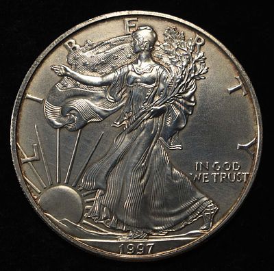 1997 AMERICAN SILVER EAGLE. LEADERS IN ON-LINE AUCTIONS ESTIMATE $110 - $160.